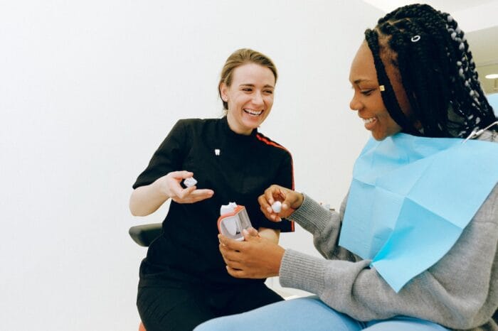patient consulting with dentist